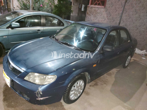 مازدا 323 2002 أزرق يدوي مستعملة للبيع في بورسعيد - 2