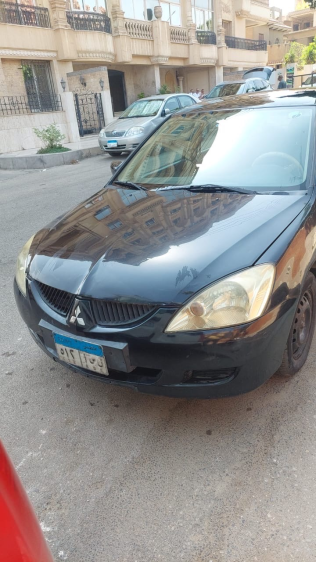 ميتسوبيشي لانسر 2005 أسود يدوي مستعملة للبيع في مصر الجديدة