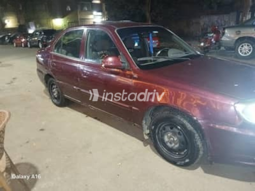 Hyundai Verna 2013 Burgundy Manual Used for Sale in Greater Cairo ( Cairo + Giza) - 1