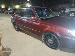 Hyundai Verna 2013 Burgundy Manual Used for Sale in Greater Cairo ( Cairo + Giza)