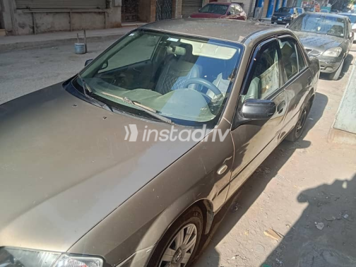 مازدا 323 2000 ذهبي أوتوماتيك مستعملة للبيع في مدينة نصر - 6