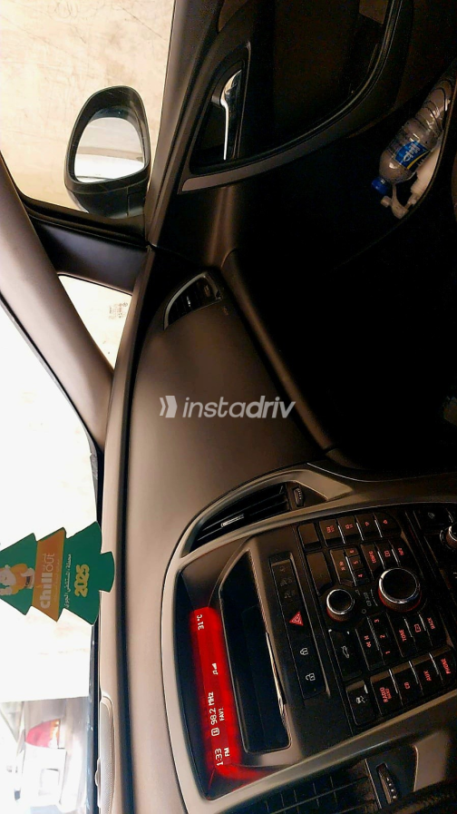 اوبل أسترا 2015 أسود أوتوماتيك مستعملة للبيع في المقطم - 1