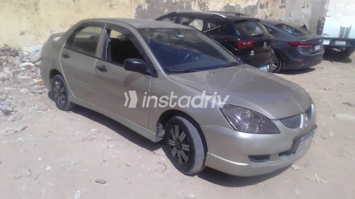 ميتسوبيشي لانسر 2006 ذهبي أوتوماتيك مستعملة للبيع في الإسكندرية - 3