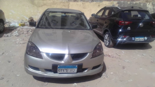 ميتسوبيشي لانسر 2006 ذهبي أوتوماتيك مستعملة للبيع في الإسكندرية