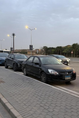 ميتسوبيشي لانسر بومة 2006 أسود أوتوماتيك مستعملة للبيع في المقطم