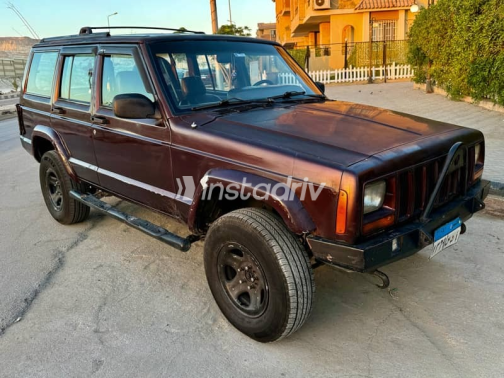 Jeep Cherokee 1999 Burgundy Automatic Used for Sale in Giza - 4