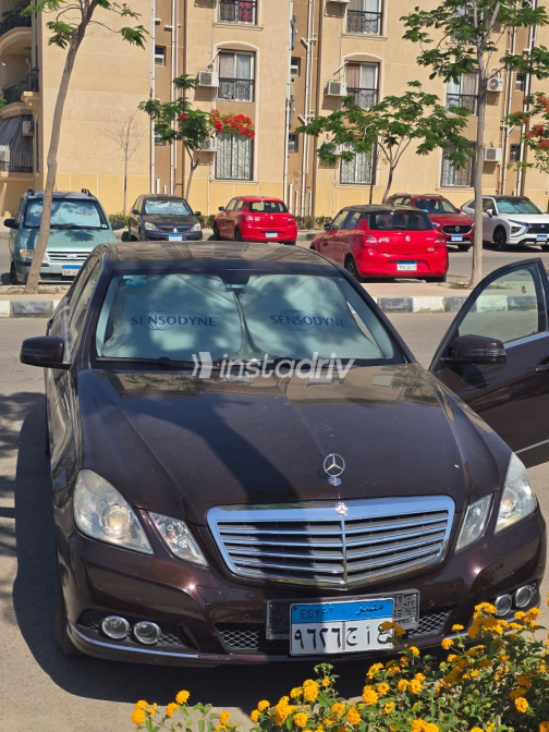 مرسيدس E 200 2010 أبيض أوتوماتيك مستعملة للبيع في مصر الجديدة - 9