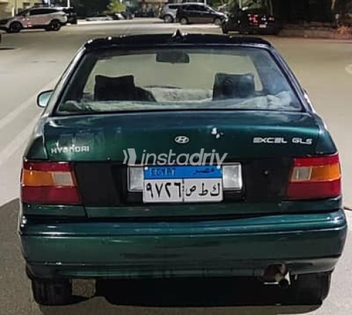 هيونداي اكسيل 1995 أخضر يدوي مستعملة للبيع في القاهرة - 1