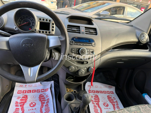 Chevrolet Spark 2011 White Manual Used for Sale in Cairo - 4