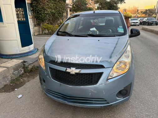 Chevrolet Spark 2011 White Manual Used for Sale in Cairo - 10