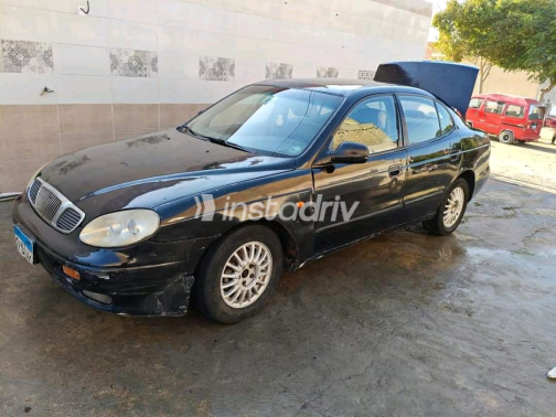دايو ليوجانزا 2001 أسود أوتوماتيك مستعملة للبيع في الوراق - 1