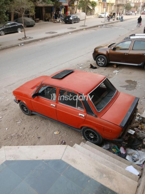 فيات 128 1988 أحمر يدوي مستعملة للبيع في حلوان - 1
