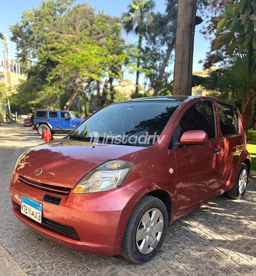 Daihatsu SIRION 2007 White Automatic Used for Sale in Helwan - 6