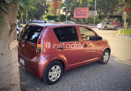 Daihatsu SIRION 2007 White Automatic Used for Sale in Helwan - 9