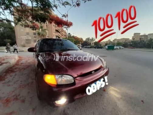 هيونداي اكسنت 1999 أحمر أوتوماتيك مستعملة للبيع في الجيزة - 1