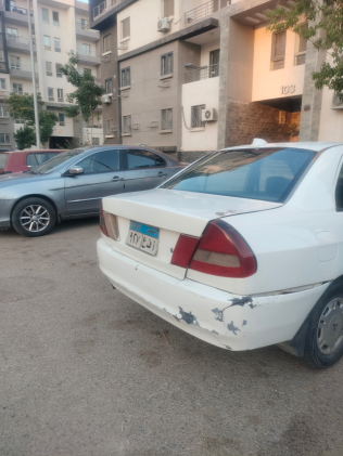 ميتسوبيشي لانسر 1998 أبيض أوتوماتيك مستعملة للبيع في القاهرة
