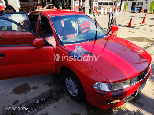 ميتسوبيشي لانسر 2000 أحمر يدوي مستعملة للبيع في الجيزة - 2