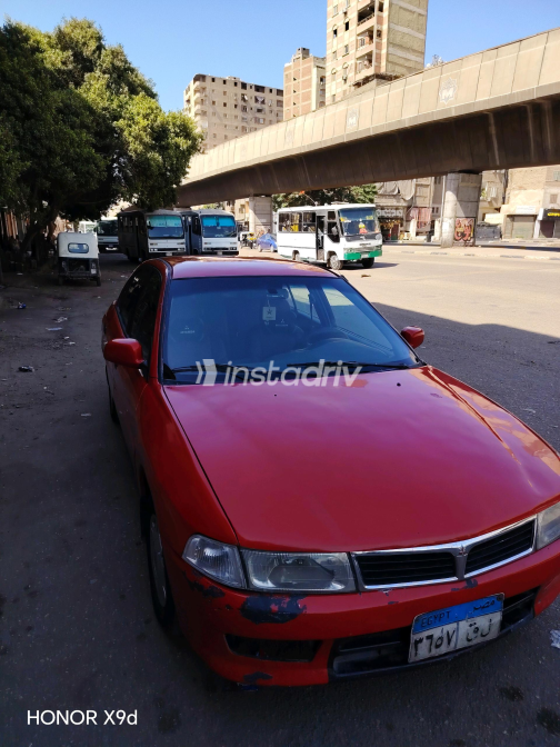 ميتسوبيشي لانسر 2000 أحمر يدوي مستعملة للبيع في الجيزة - 4