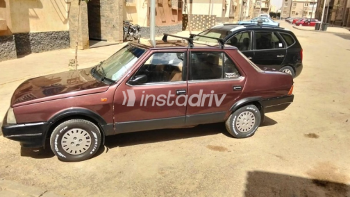 فيات ريجاتا 1986 أحمر غامق يدوي مستعملة للبيع في القاهرة الكبرى ( القاهرة - الجيزة) - 4