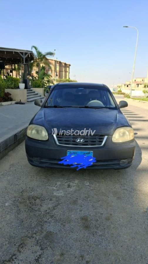 هيونداي فيرنا 2006 أسود يدوي مستعملة للبيع في مدينة الشيخ زايد - 1