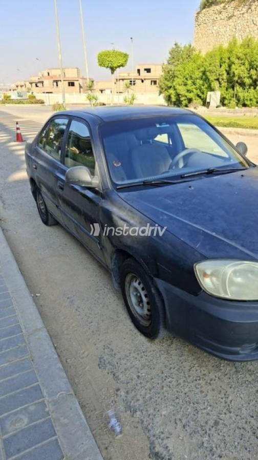 هيونداي فيرنا 2006 أسود يدوي مستعملة للبيع في مدينة الشيخ زايد - 3