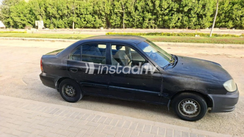 هيونداي فيرنا 2006 أسود يدوي مستعملة للبيع في مدينة الشيخ زايد - 4