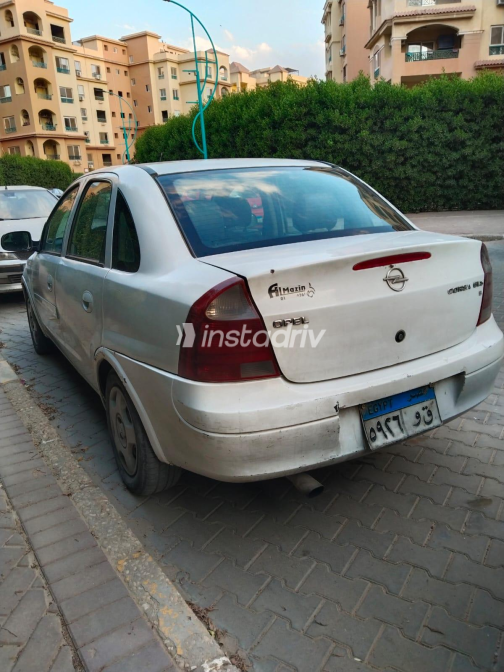 اوبل كورسا 2005 أبيض يدوي مستعملة للبيع في الجيزة - 5