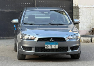 ميتسوبيشي لانسر 2016 رمادي أوتوماتيك مستعملة للبيع في شبرا الخيمة