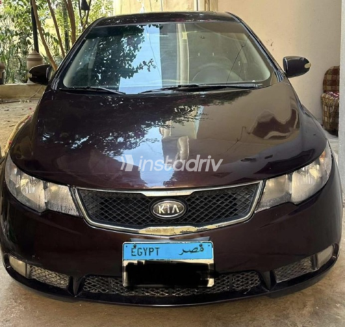 Kia Cerato 2010 Eggplant Automatic Used for Sale in Sharqia - 3