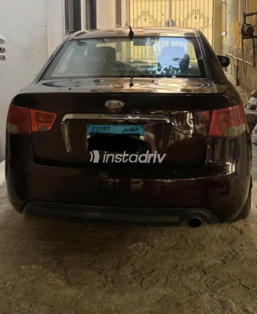 Kia Cerato 2010 Eggplant Automatic Used for Sale in Sharqia - 4
