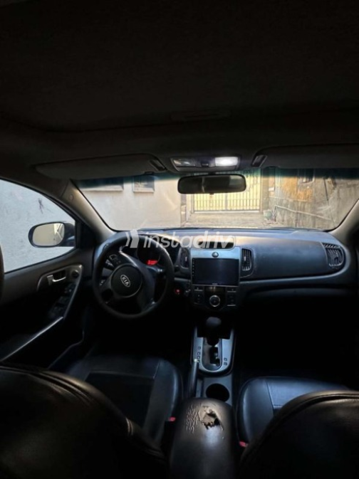 Kia Cerato 2010 Eggplant Automatic Used for Sale in Sharqia - 5