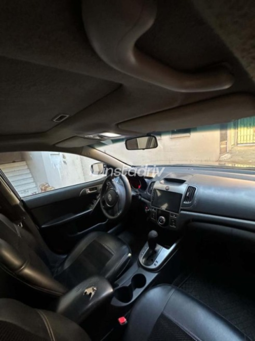 Kia Cerato 2010 Eggplant Automatic Used for Sale in Sharqia - 6