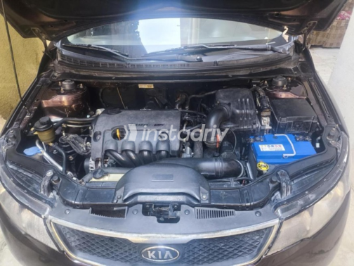 Kia Cerato 2010 Eggplant Automatic Used for Sale in Sharqia - 7