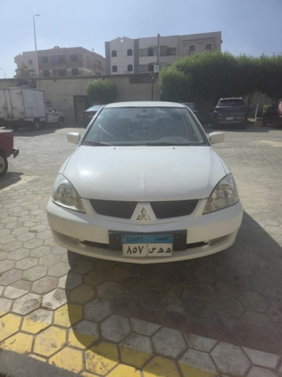 Mitsubishi Lancer Puma 2011 White Automatic Used for Sale in Obour City