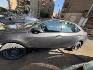 تويوتا كورولا 2018 رمادي أوتوماتيك مستعملة للبيع في مدينة نصر