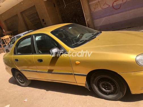 دايو لانوس 2 1999 ذهبي يدوي مستعملة للبيع في الهرم - 5