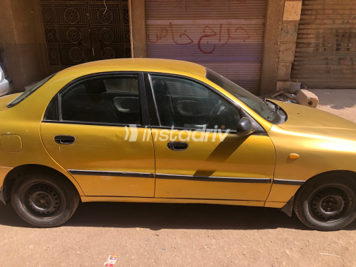 دايو لانوس 2 1999 ذهبي يدوي مستعملة للبيع في الهرم - 9