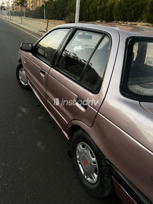 Mitsubishi Lancer 1990 Purple Manual Used for Sale in Giza - 1