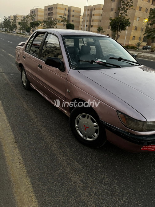 Mitsubishi Lancer 1990 Purple Manual Used for Sale in Giza - 5