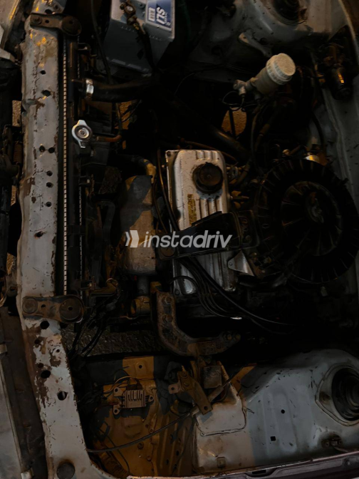 Mitsubishi Lancer 1990 Purple Manual Used for Sale in Giza - 8