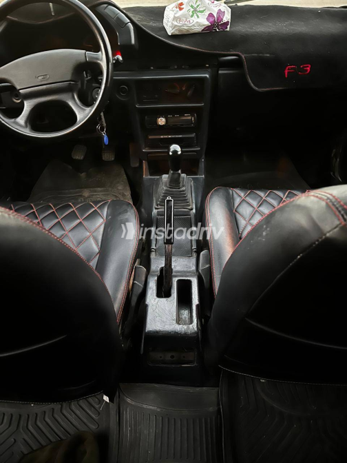 Mitsubishi Lancer 1990 Purple Manual Used for Sale in Giza - 10