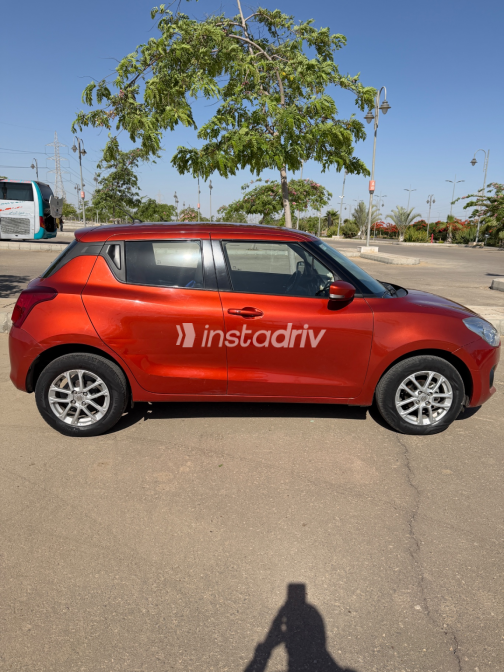 Suzuki Swift 2021 Orange Manual Used for Sale in Heliopolis - 1