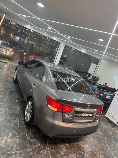 Kia Forte 2010 Beige Automatic Used for Sale in Greater Cairo ( Cairo + Giza) - 1