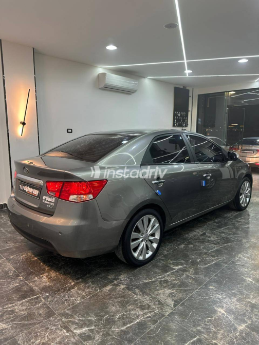 Kia Forte 2010 Beige Automatic Used for Sale in Greater Cairo ( Cairo + Giza) - 5