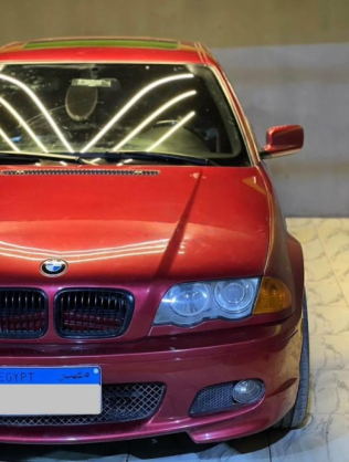 بي ام دبليو 318 2001 أحمر أوتوماتيك مستعملة للبيع في فاقوس