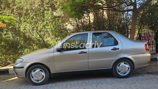 فيات سينا 2006 ذهبي يدوي مستعملة للبيع في الإسكندرية - 1