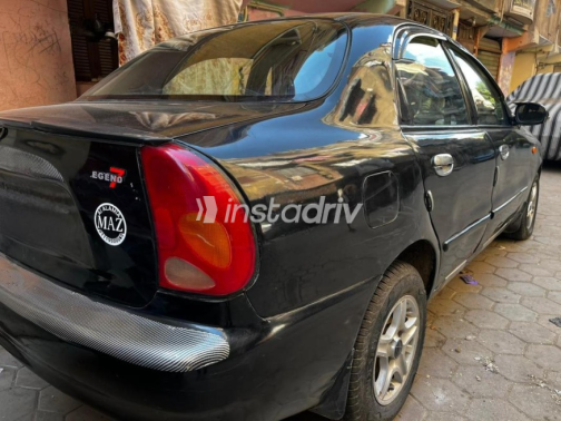 دايو لانوس 2 2002 أسود يدوي مستعملة للبيع في شبرا الخيمة - 4