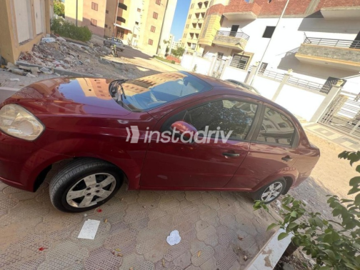 Chevrolet Aveo 2012 Dark Red Manual Used for Sale in Sadat City - 3