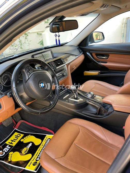 BMW 320 2014 White Automatic Used for Sale in Maadi - 8
