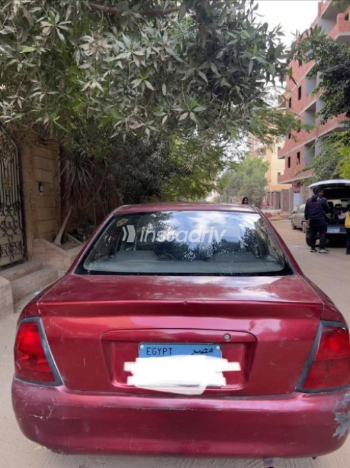 مازدا 323 2000 أحمر يدوي مستعملة للبيع في 6 أكتوبر - 1